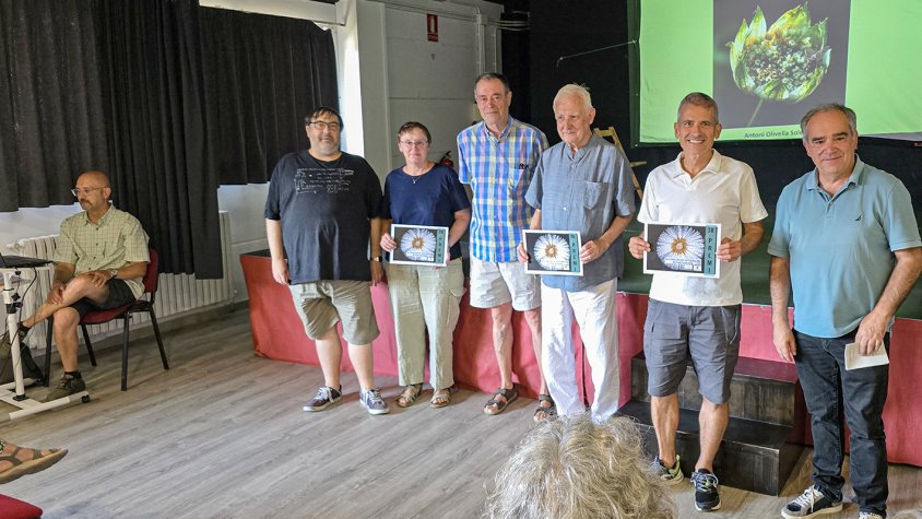 Els premiats, acompanyats pels membres del jurat de la novena edició del concurs de fotografies