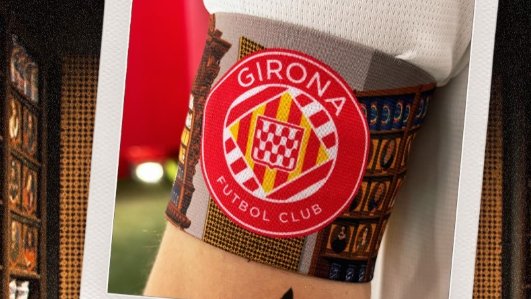 La farmàcia Esteva de Llívia, protagonista del braçal del Girona FC contra l’Atlético